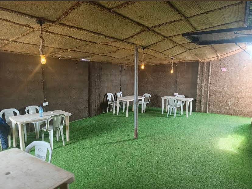 Covered outdoor seating area at De Blue Nile Wave Hotel