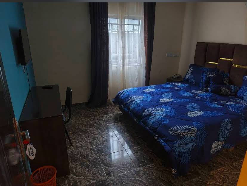 Guest room with blue bedding